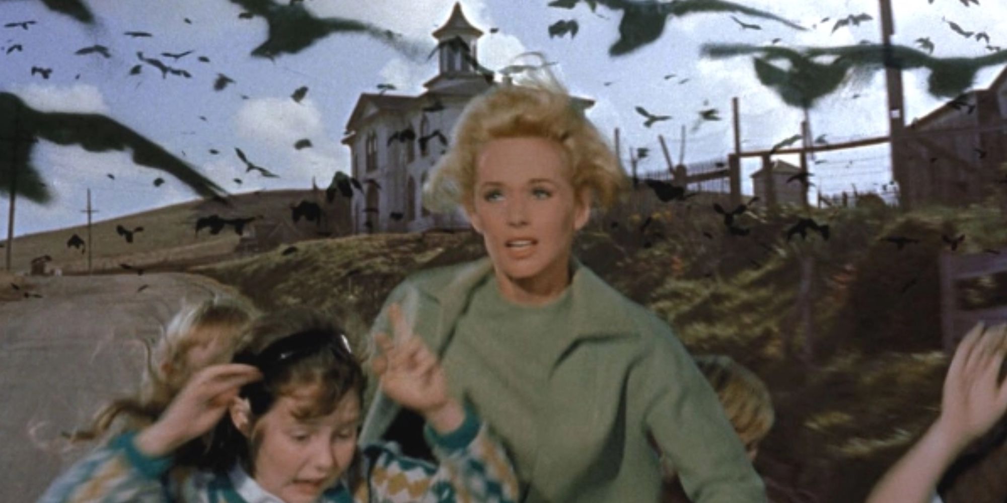 Characters running away in Alfred Hitchcock’s The Birds