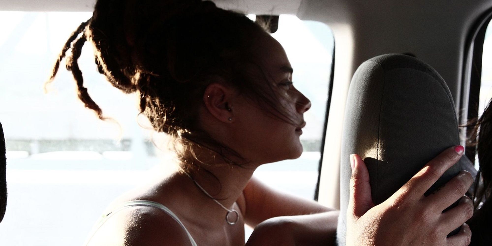 Star in the car during road trip in American Honey.