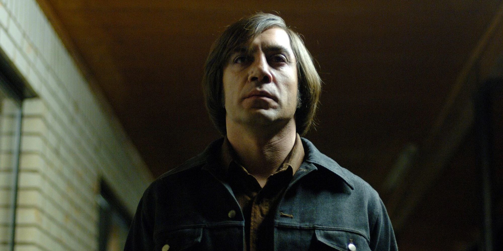 Javier Barder as Anton Chigurh looking serious in No Country For Old Men