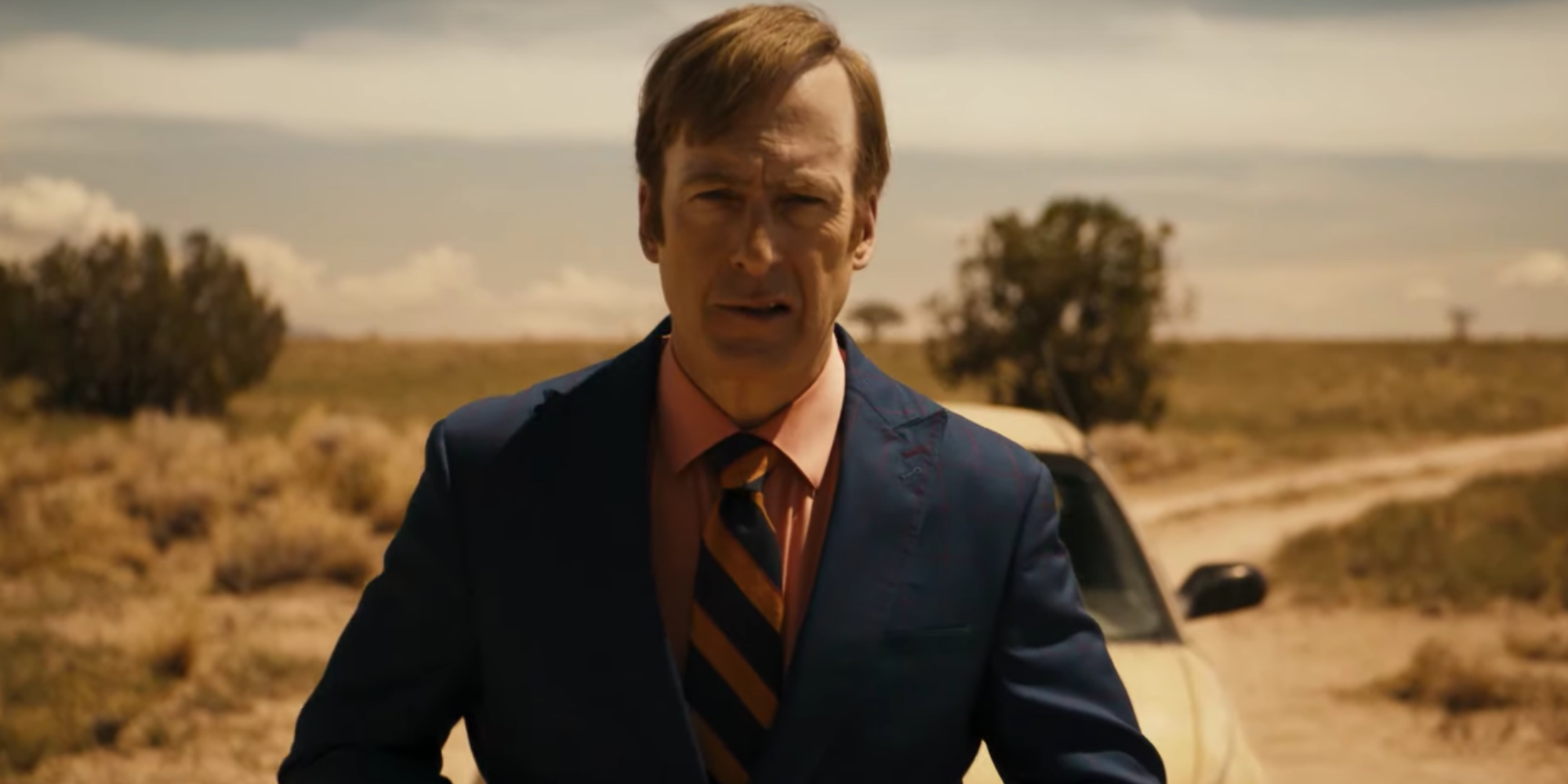 Better Call Saul season 5 jimmy stand in front of his car and waits for the cartel