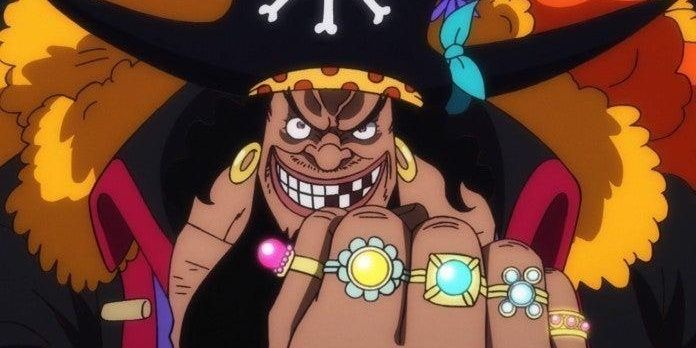 Blackbeard showing off his rings with a fist