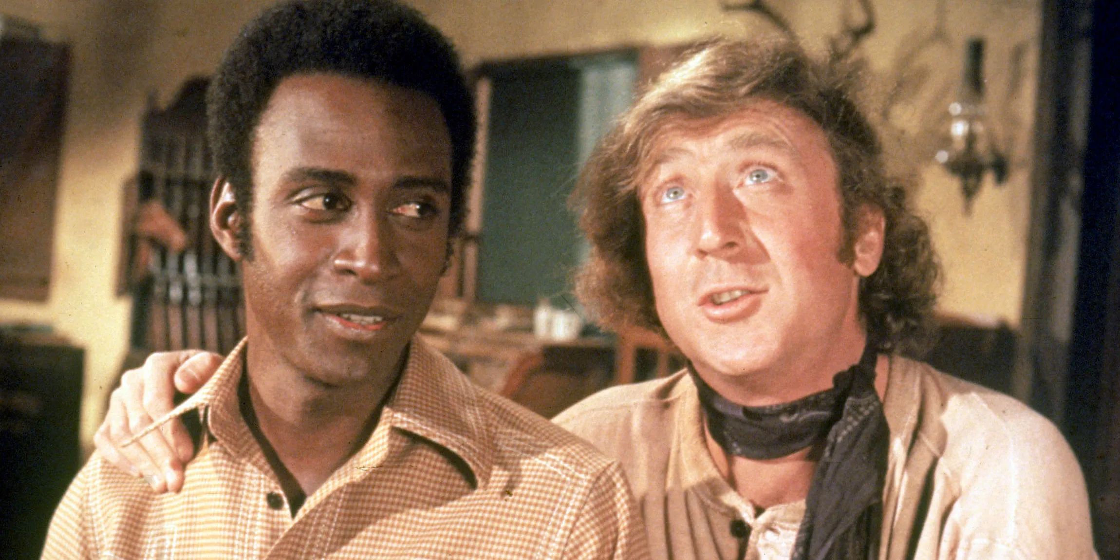 Cleavon Little and Gene Wilder smiling in Blazing Saddles