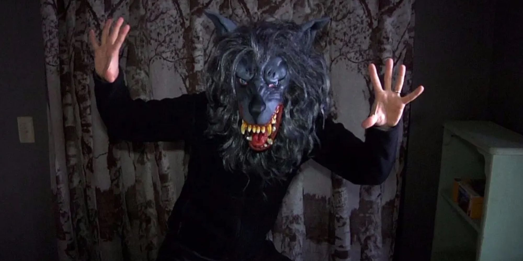 Man in creepy wolf mask