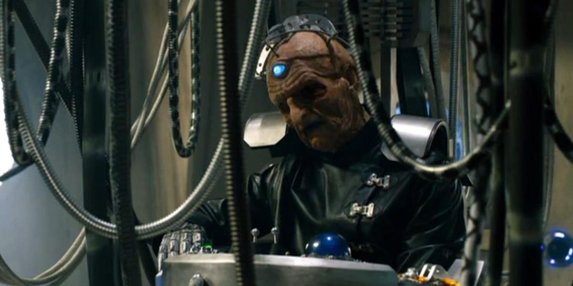 Davros surrounded by wires and tubes