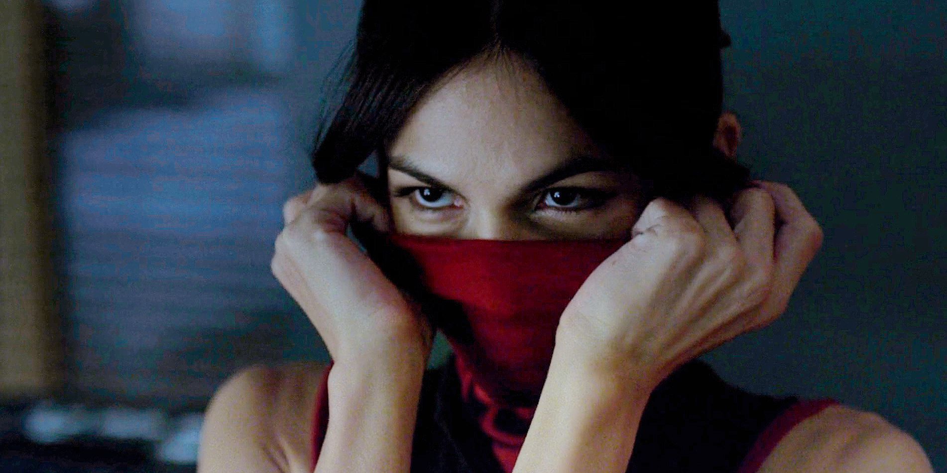 Elodie Yung's Elektra pulling up her ninja mask in Daredevil
