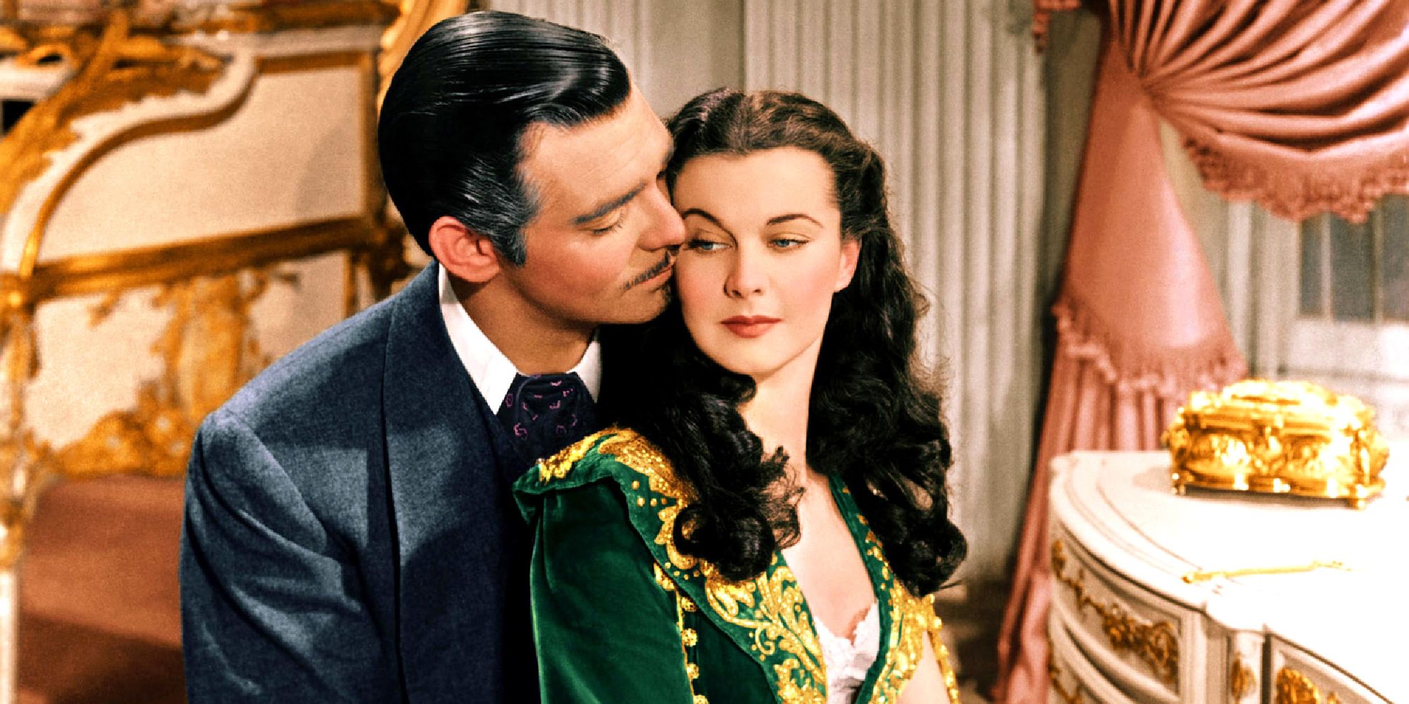 Clark Gable and Vivien Leigh as Red and Scarlett embracing in Gone With the Wind