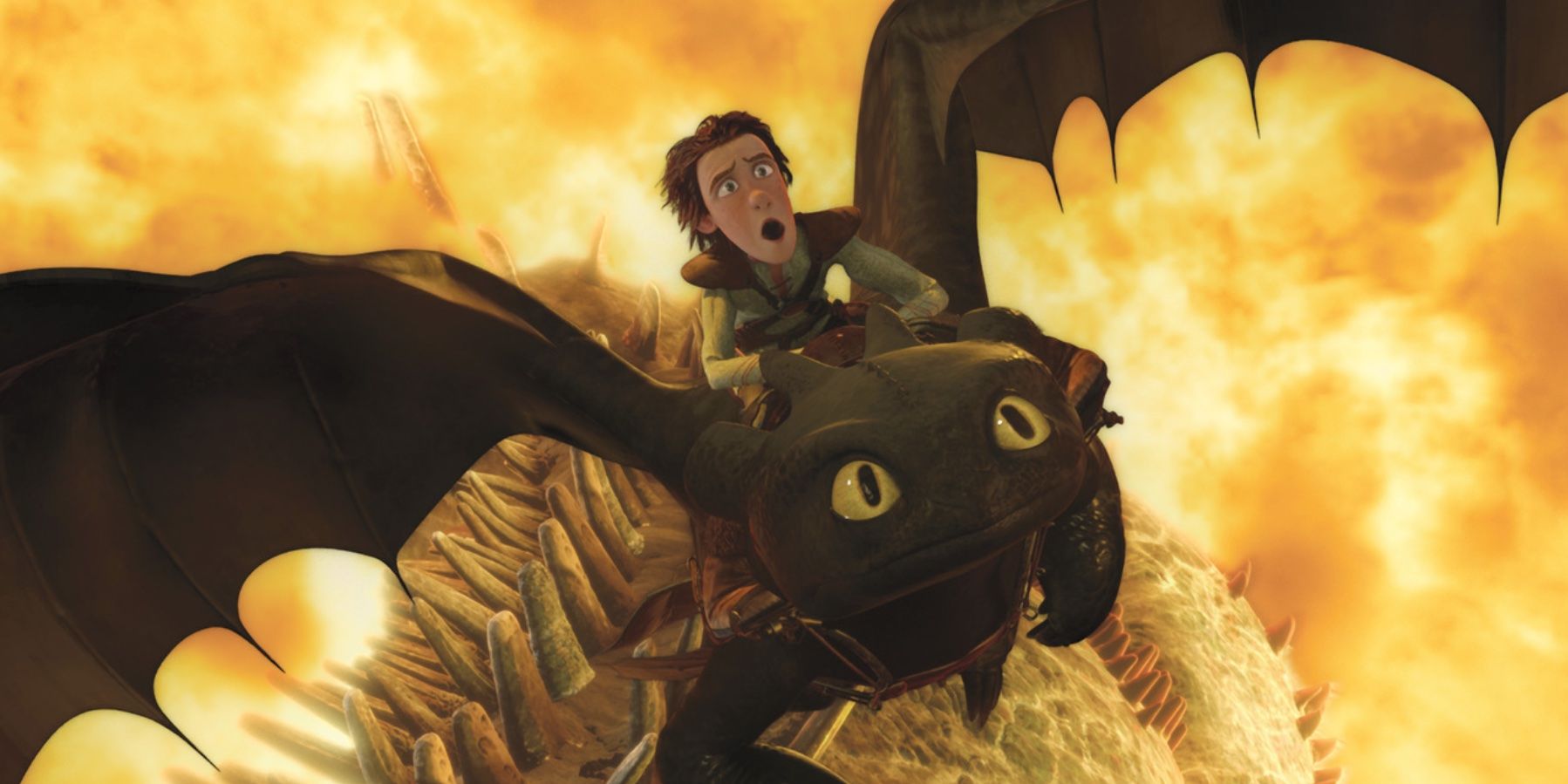 Hiccup flying on toothless with an explosion behind him in 'How To Train Your Dragon'