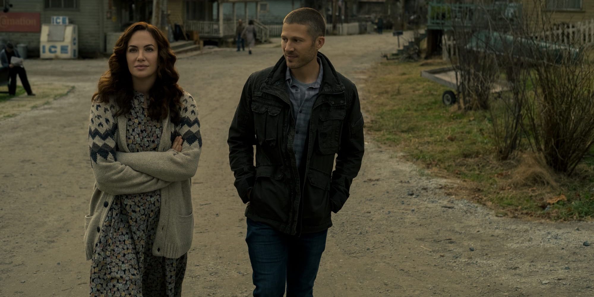 Kate Siegel and Zach Gilford, as Erin and Riley, catch up during a walk through town.