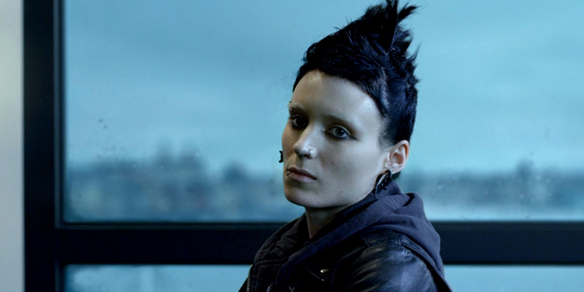 Lisbeth Salander looking serious in The Girl With the Dragon Tattoo