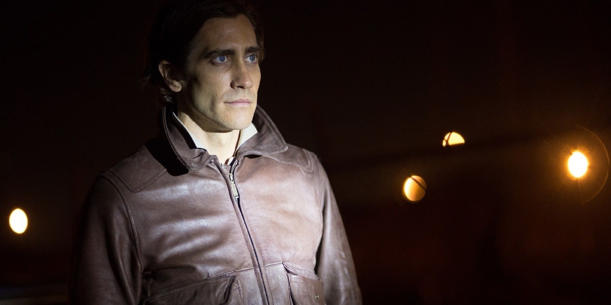 Lou Bloom staring into the cop's flashlight in Nightcrawler.