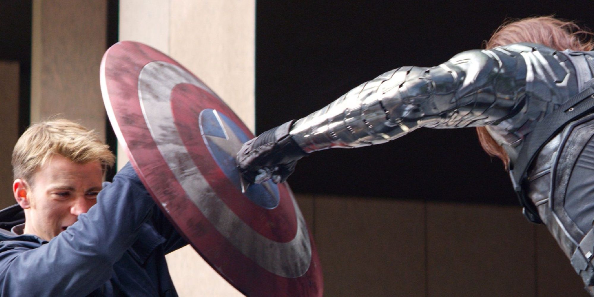 Captain America and The Winter Soldier fighting with shield.