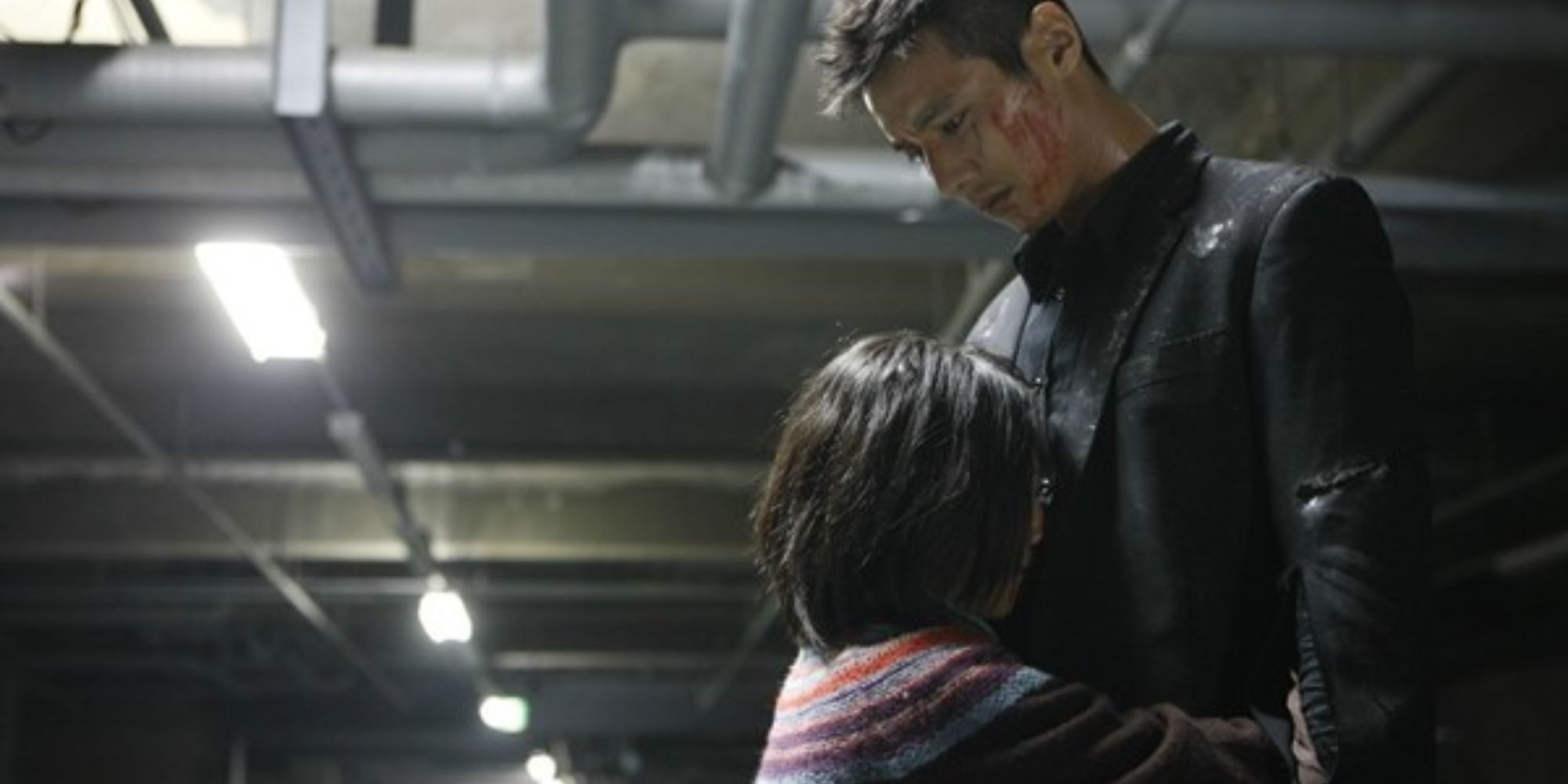 Kim Sae-ron as So-mi hugs Cha Tae-Sik played by Won Bin in The Man From Nowhere