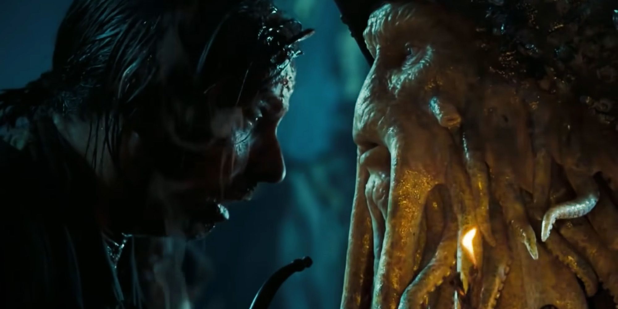 Davy Jones facing a man in Pirates of the Caribbean Dead Man&rsquo;s Chest