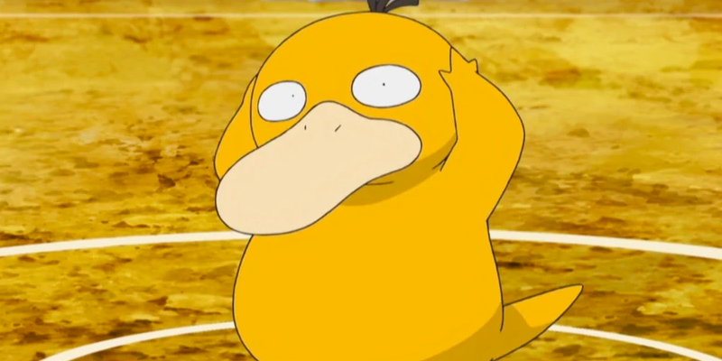 Psyduck holds its head in confusion in the middle of a battle arena in Pokemon.