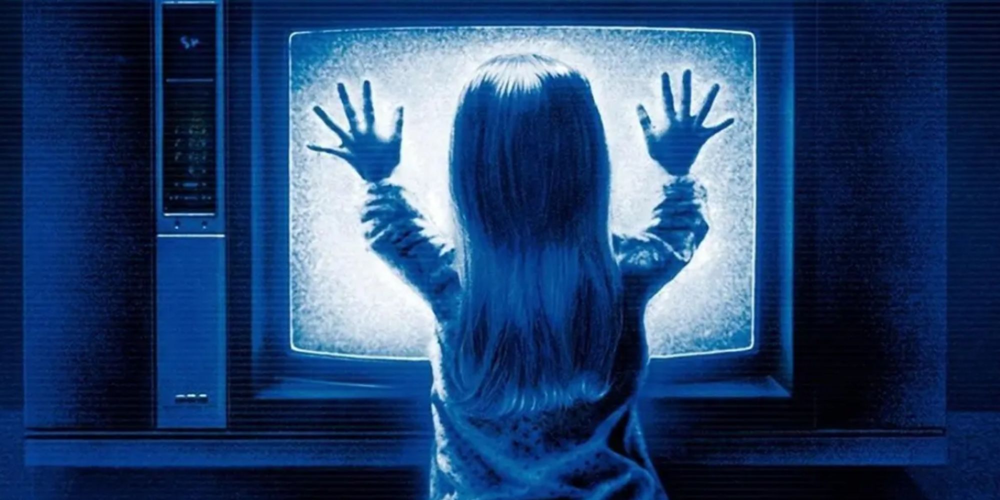 Child in front of television screen in Poltergeist
