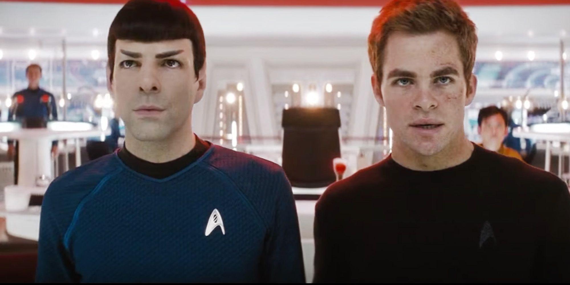 Spock and Kirk aboard the Enterprise side by side looking confused in Star Trek.