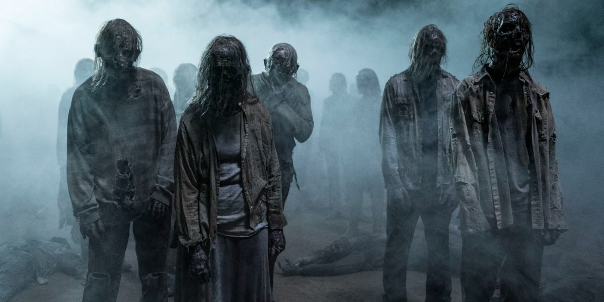 THE WALKING DEAD walkers approach the camera through fog