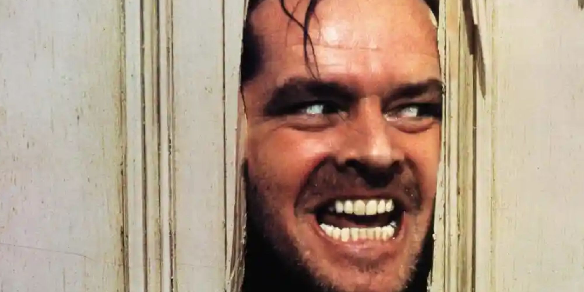 Jack Nicholson in the "here's Johnny!" scene in The Shining