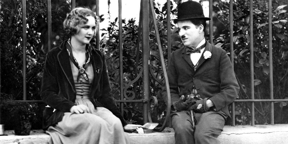 The Tramp (Charlie Chaplin) and his blind love (Virginia Cherrill) in City Lights