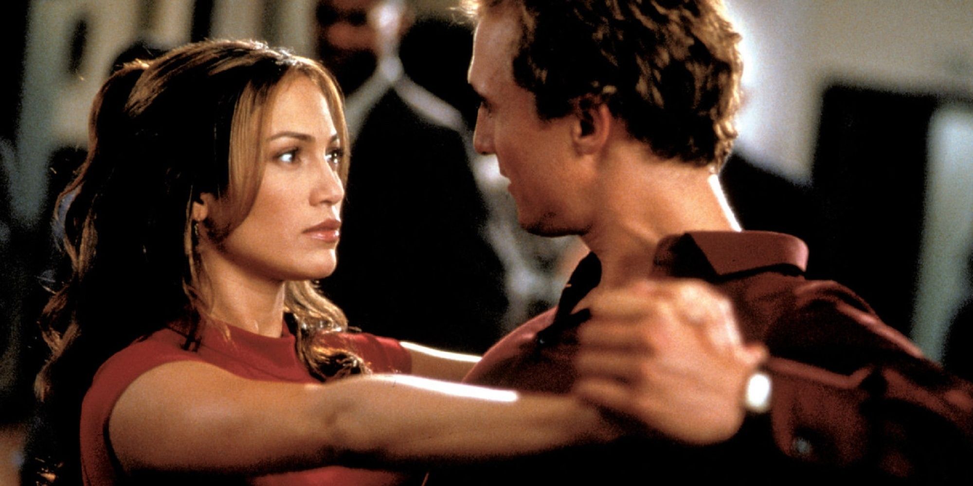 Jennifer Lopez and Matthew McConaughey dancing.