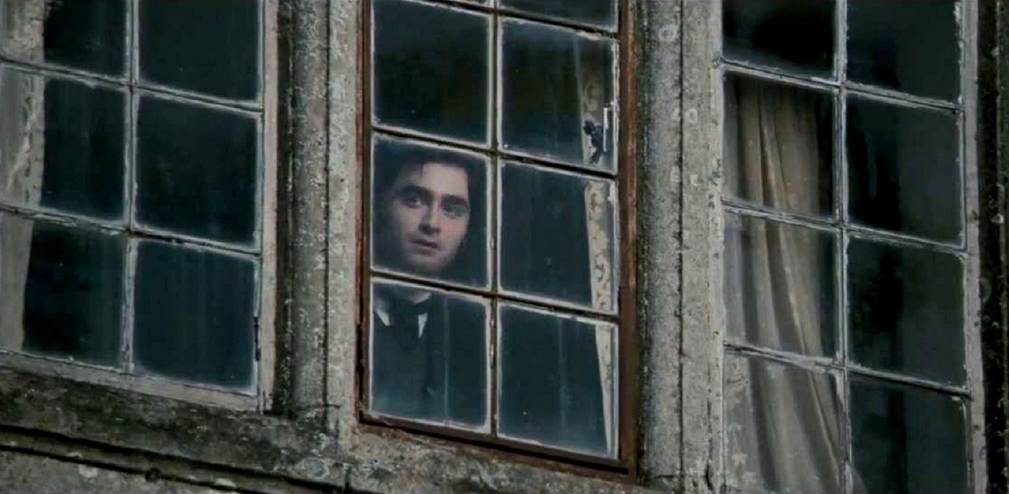 Woman in Black - Daniel Radcliffe looking out the window