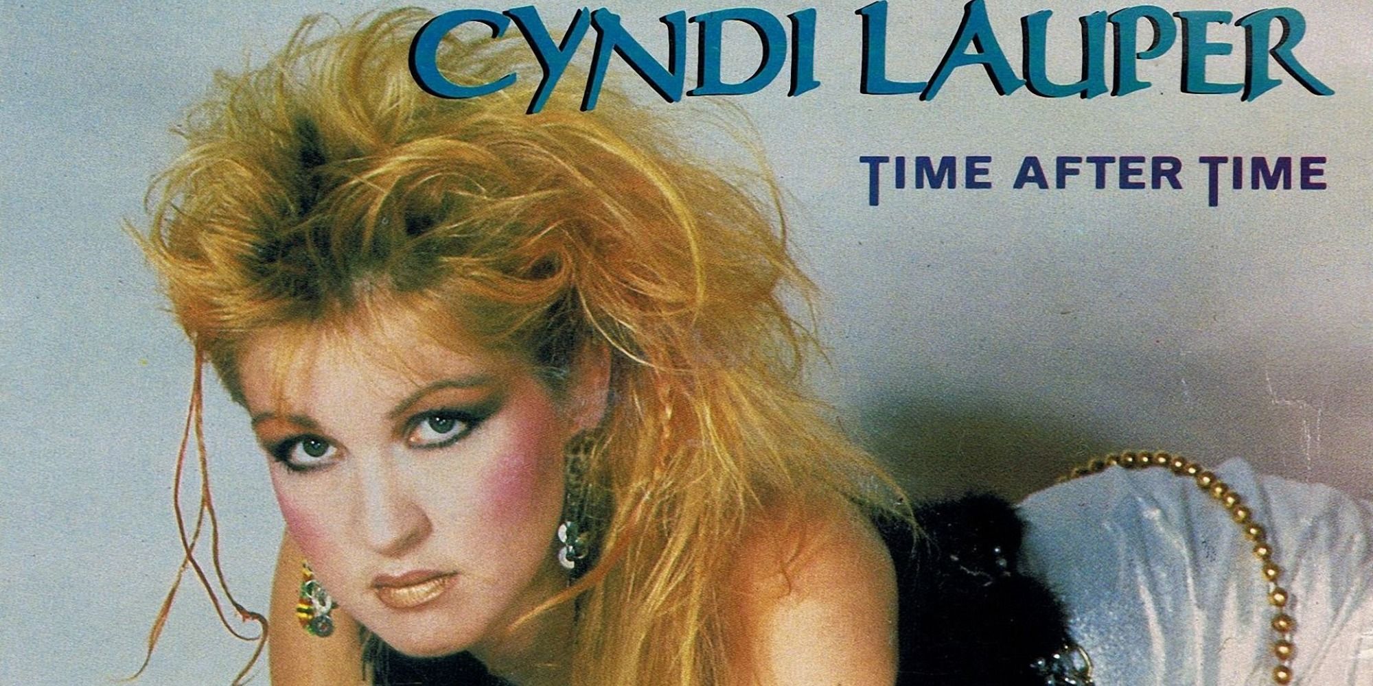 "Time After Time" by Cyndi Lauper album cover with her staring directly at you 