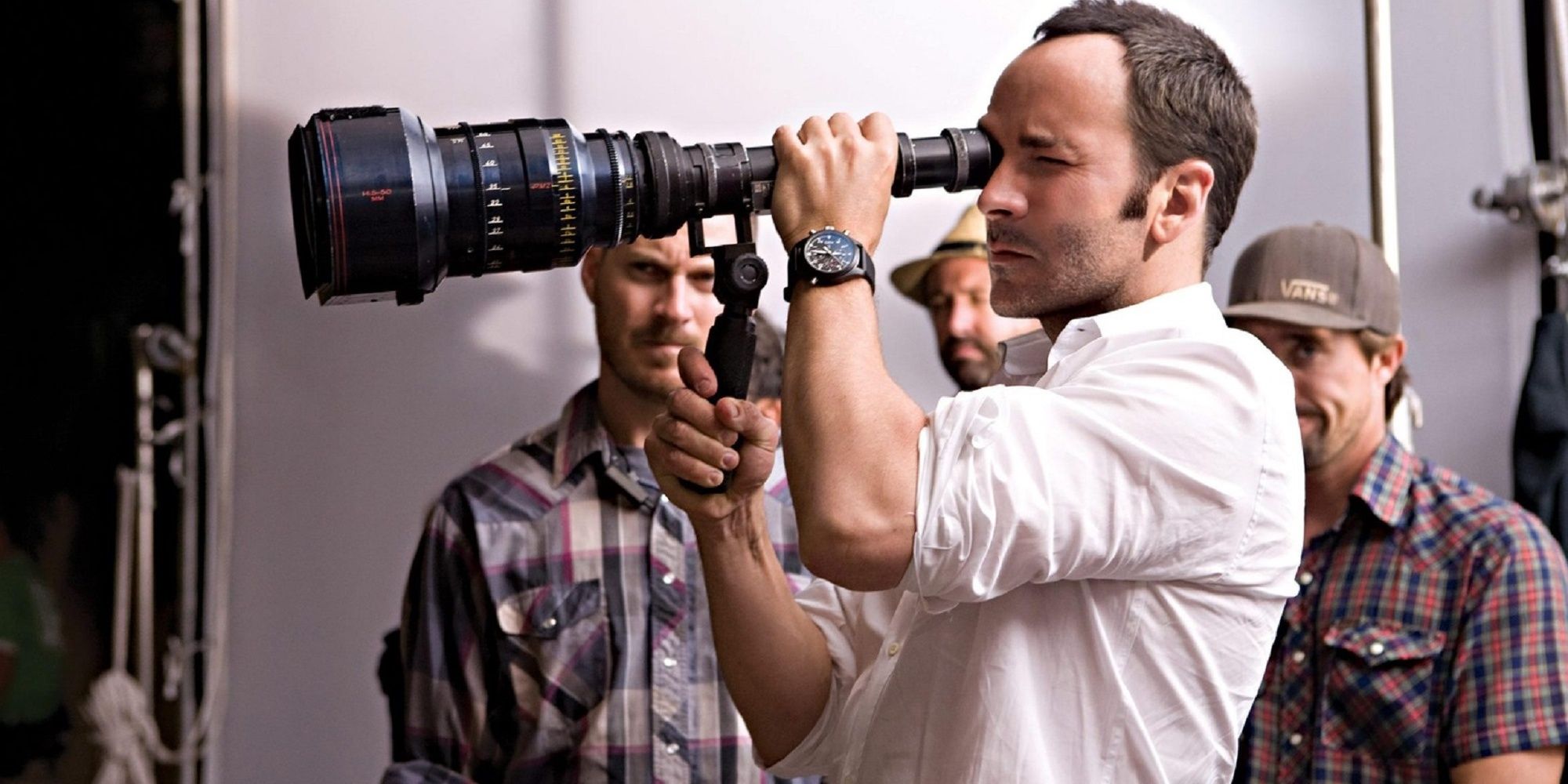 Tom Ford on set with camera filming movie.