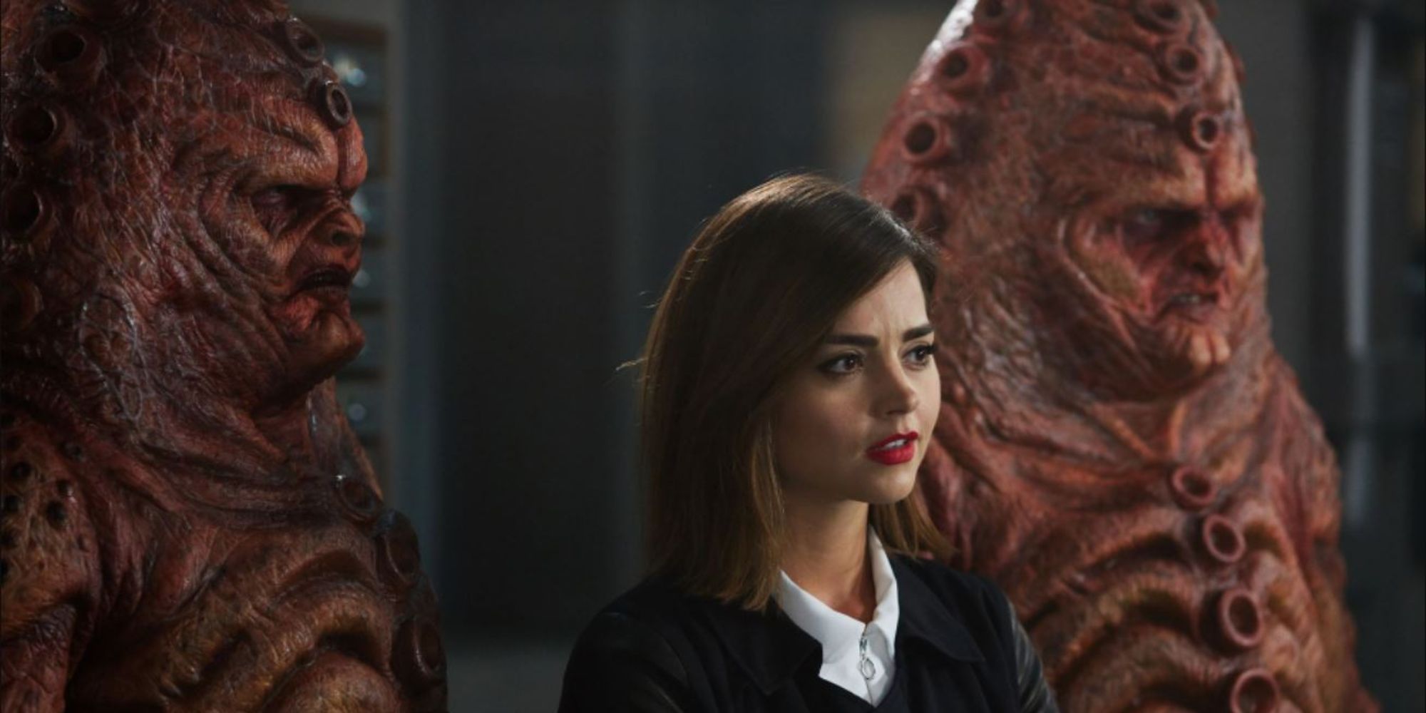 Zygons and Clara standing in formation