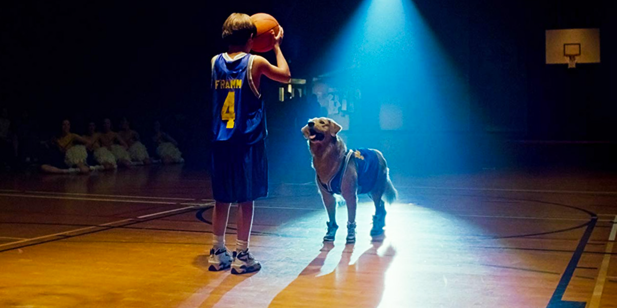 Josh and Buddy take the court at halftime in Airbud