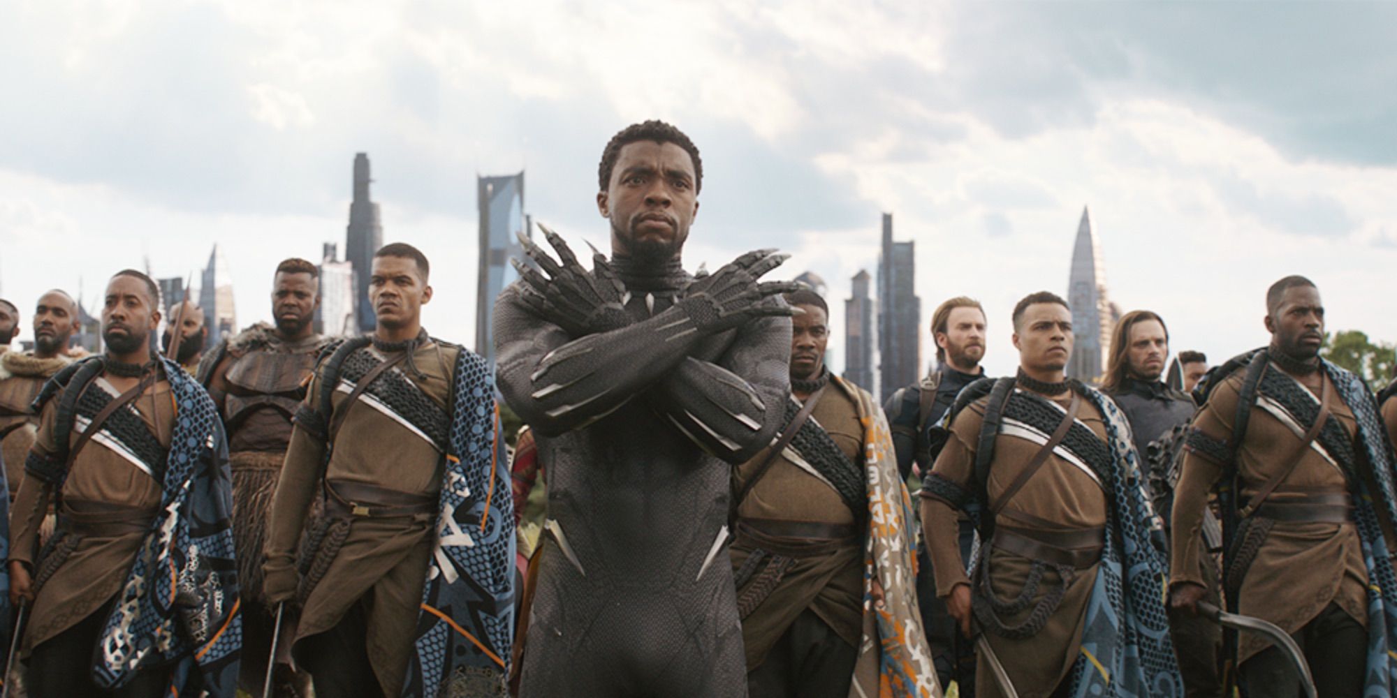 Chadwick Boseman as Black Panther doing the Wakanda Forever salute in Black Panther (2018)