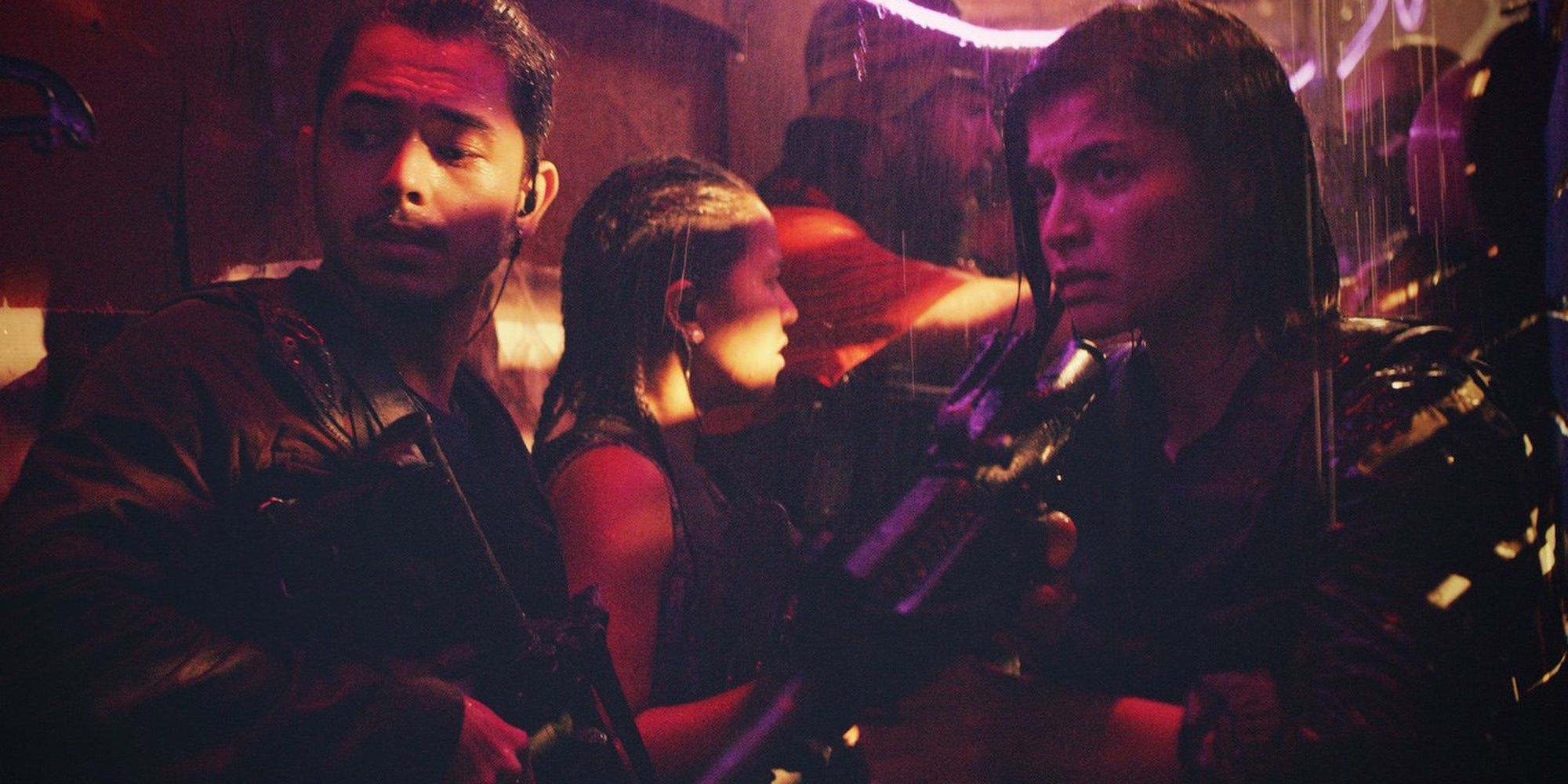 The cast of Buybust armed with guns