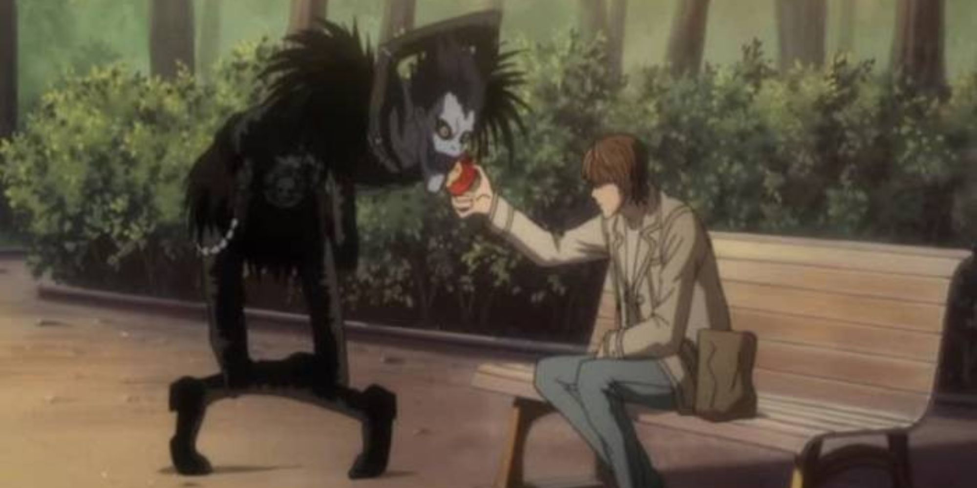 A man sits on a park bench and holds an apple out to the sinister Ryuk in Death Note.