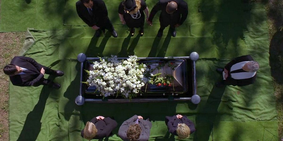 The members of Criminal Minds at Emily Prentiss' funeral after she faked her death