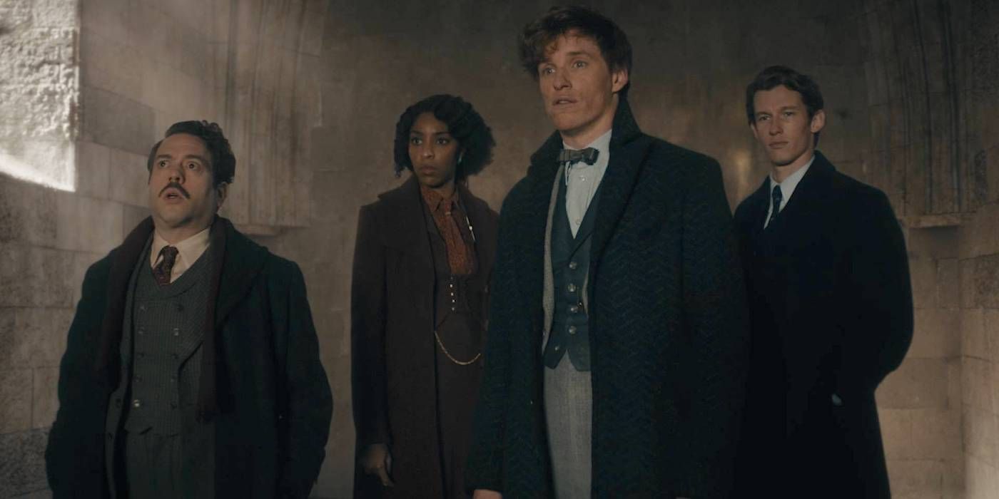 A group of characters looking in the same direction in Fantastic Beasts: The Secrets Of Dumbledore.