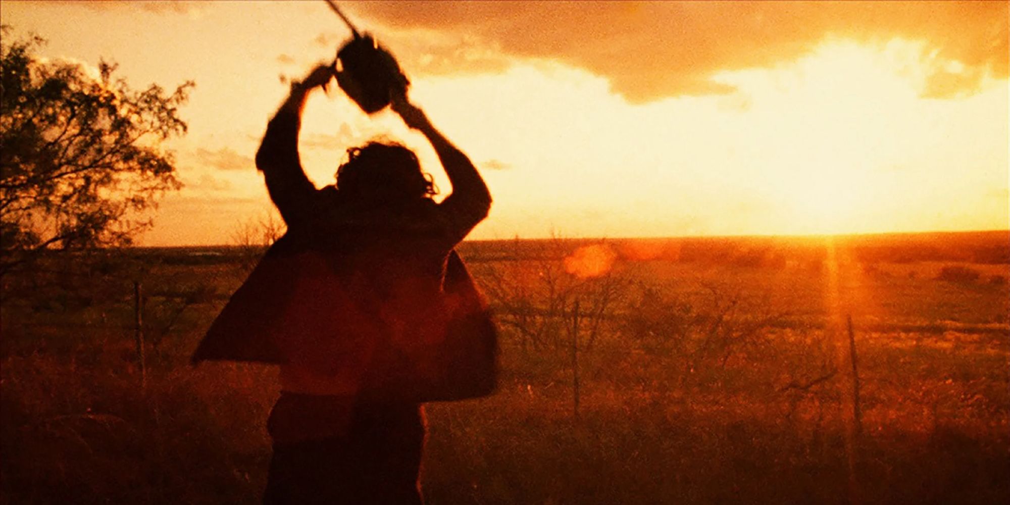 Leatherface swinging his chainsaw around in The Texas Chain Saw Massacre
