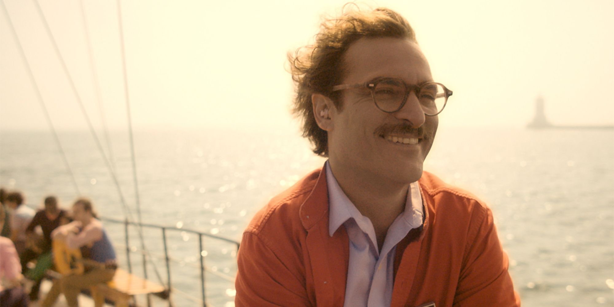 Joaquin Phoenix as Theodore on a ferry in Her 