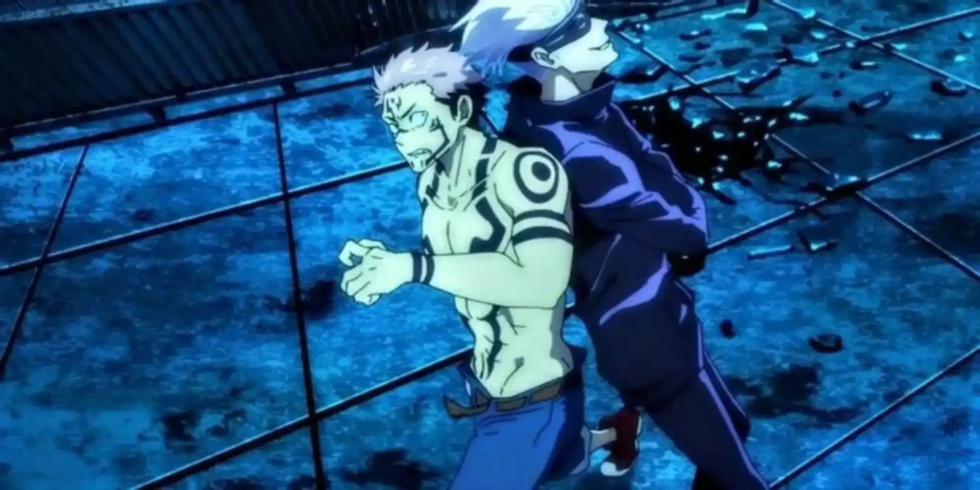A character with a lot of tattoos stands back to back with another in Jujutsu Kaisen.