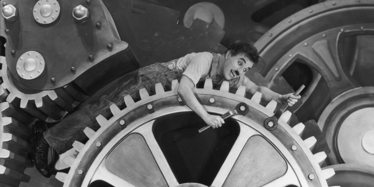 Charlie Chaplin as a factory worker in Modern Times