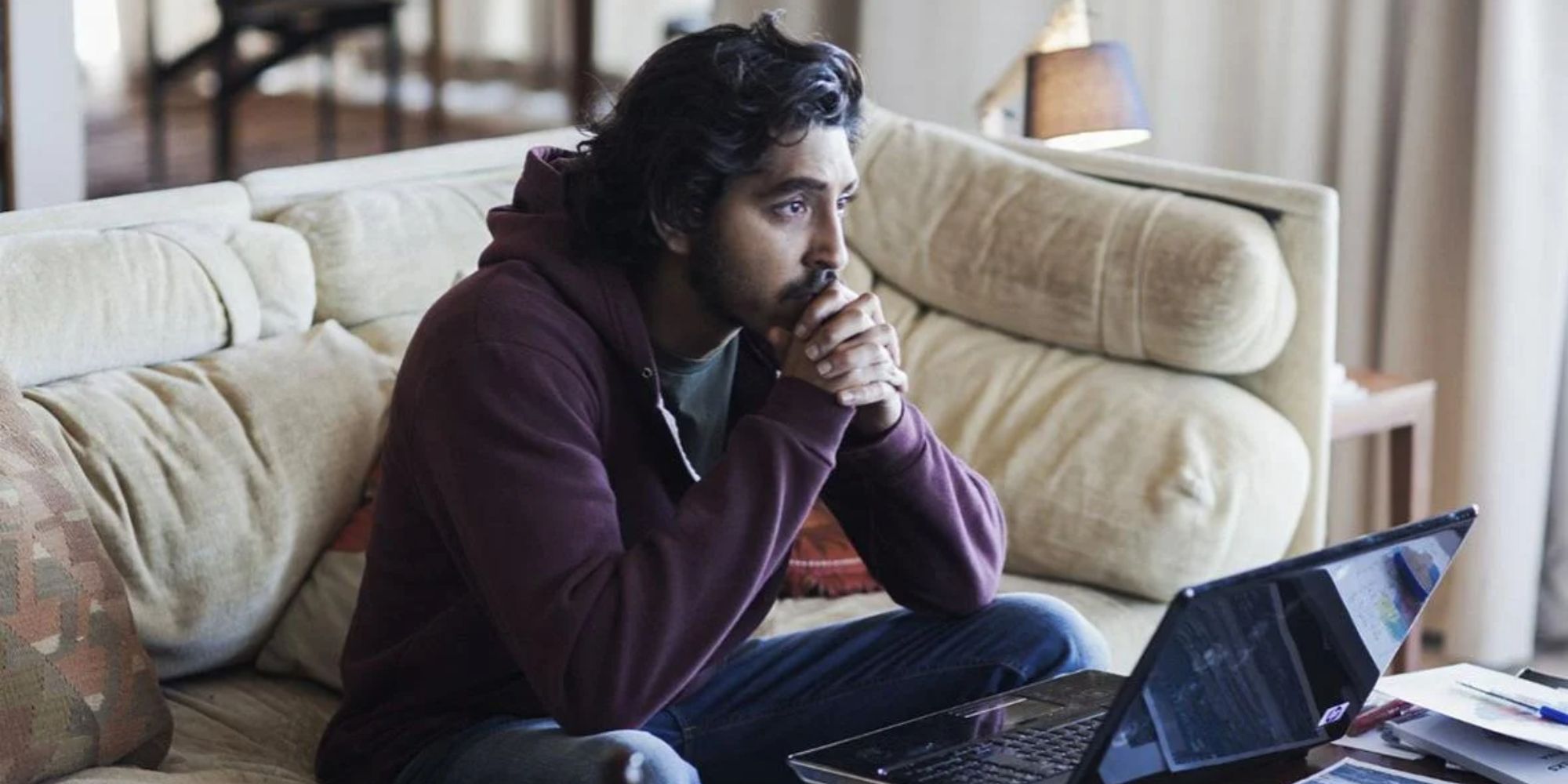 still of saroo looking pensive in lion