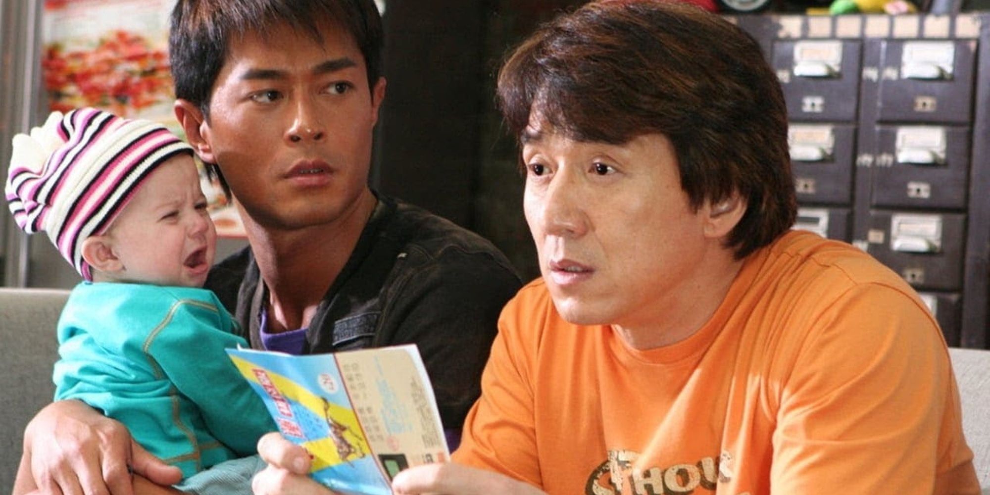 Jackie Chan, Louis Koo, and Matthew the Baby in Rob-B-Hood