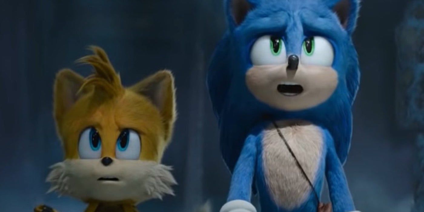 Tails y Sonic miran hacia arriba con expresiones confusas en Sonic the Hedgehog 2.