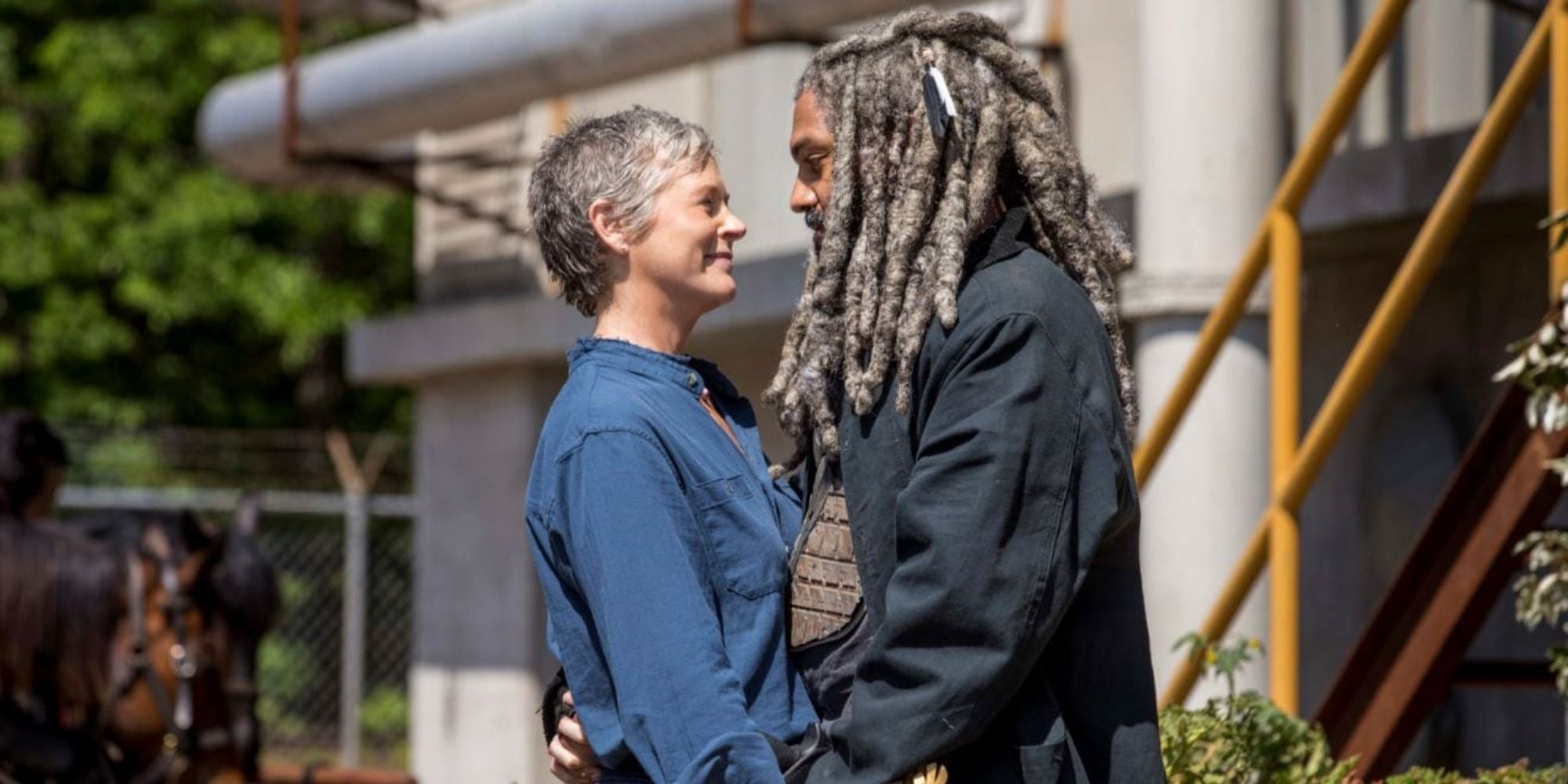Carol and King Ezekiel lovingly embrace each other in The Kingdom in 'The Walking Dead'