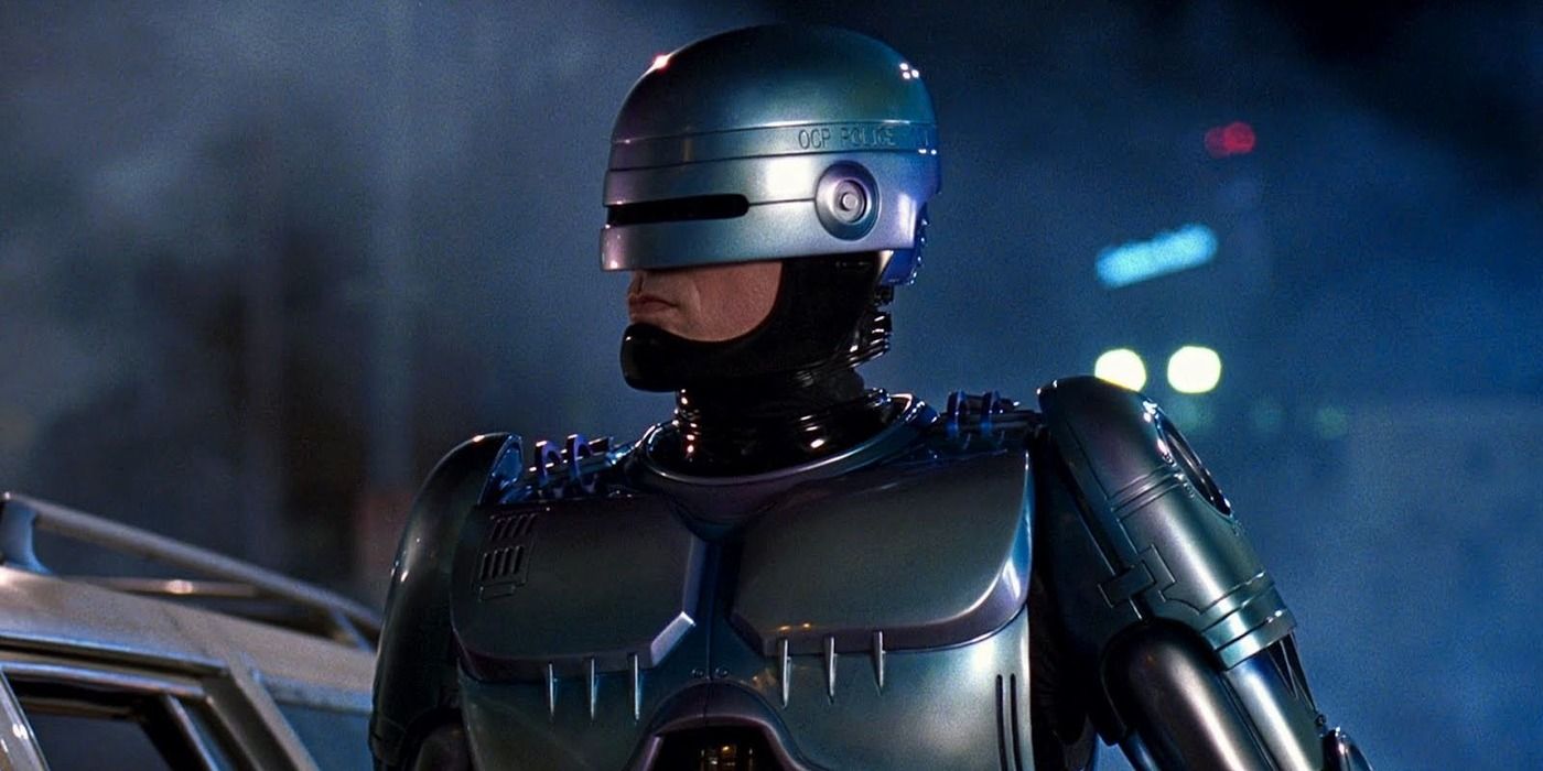 Robocop (Peter Weller) in a heroic pose, looking left of frame in Paul Verhoeven's 'Robocop'