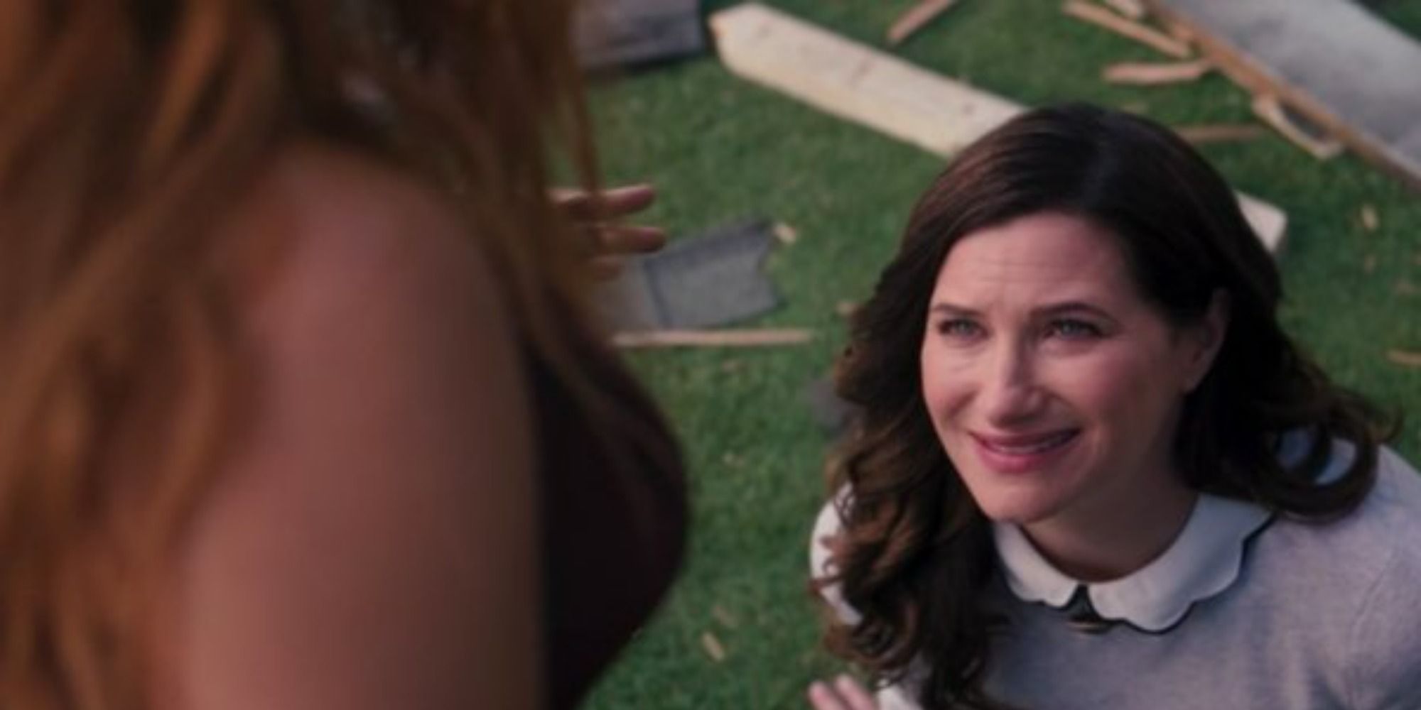 Agatha Harkness (Kathryn Hahn) being trapped in her nosy neighbor personality by Wanda Maximoff (Elizabeth Olsen) in WandaVision.