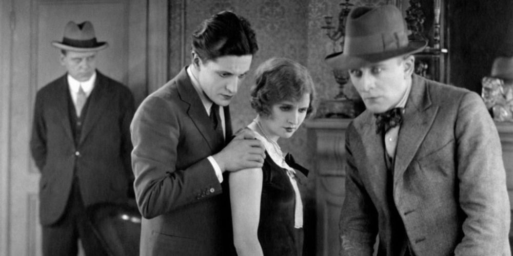 Ivor Novello, June Tripp, and Malcolm Keen in Alfred Hitchcock's The Lodger A Story of the London Fog