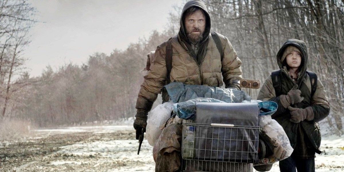 A man and his son walking with a shopping cart