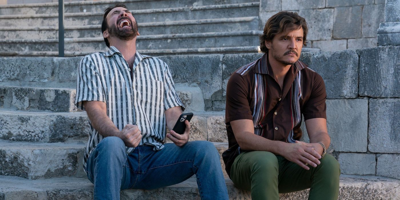 Nicolas Cage and Pedro Pascal drinking together in The Unbearable Weight of Massive Talent