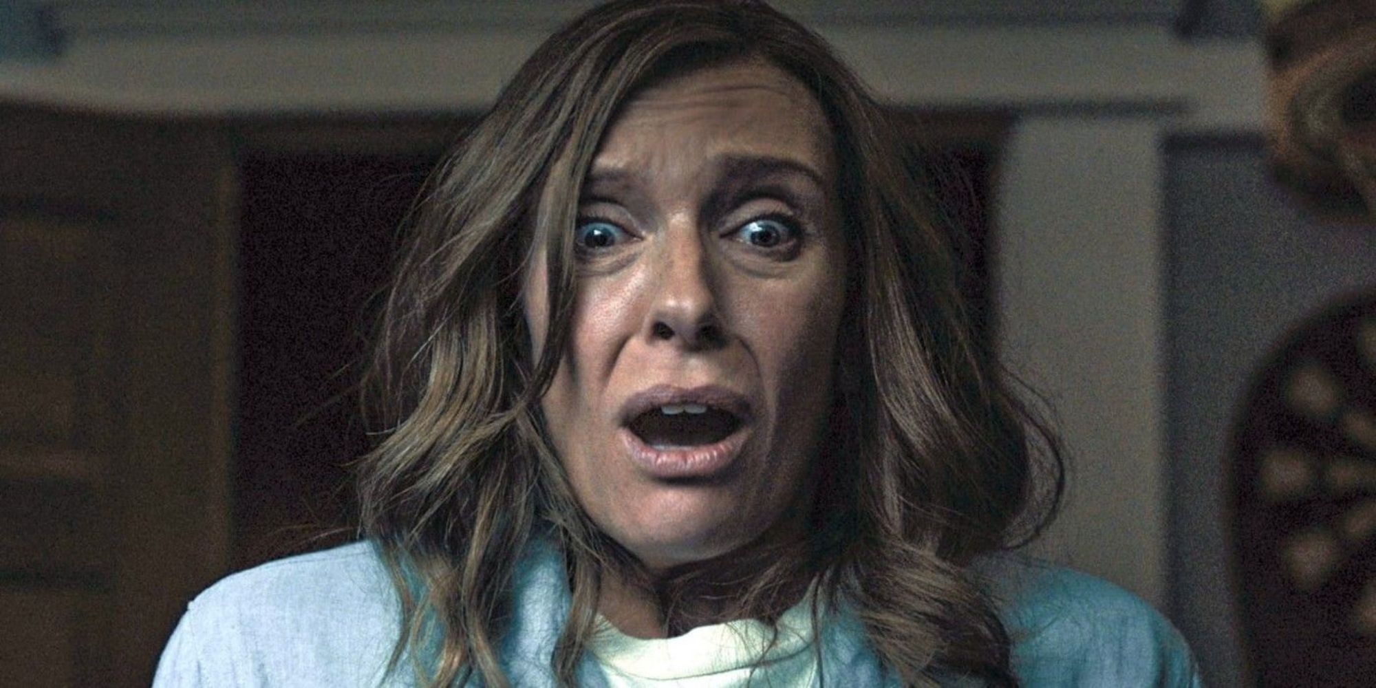 Annie Graham (Toni Collette) recoils in terror in 'Hereditary'.