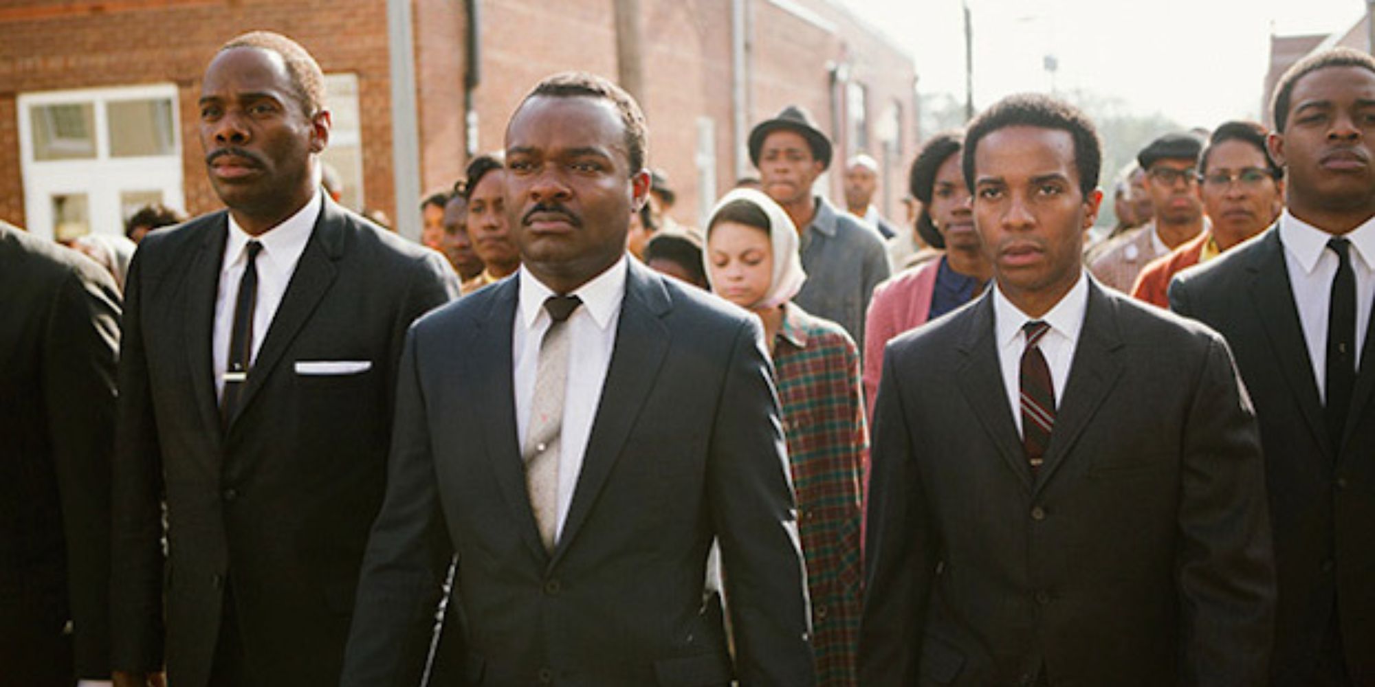 Martin Luther King Jr., Ralph Abernathy, and Andrew Young leading a march in Selma