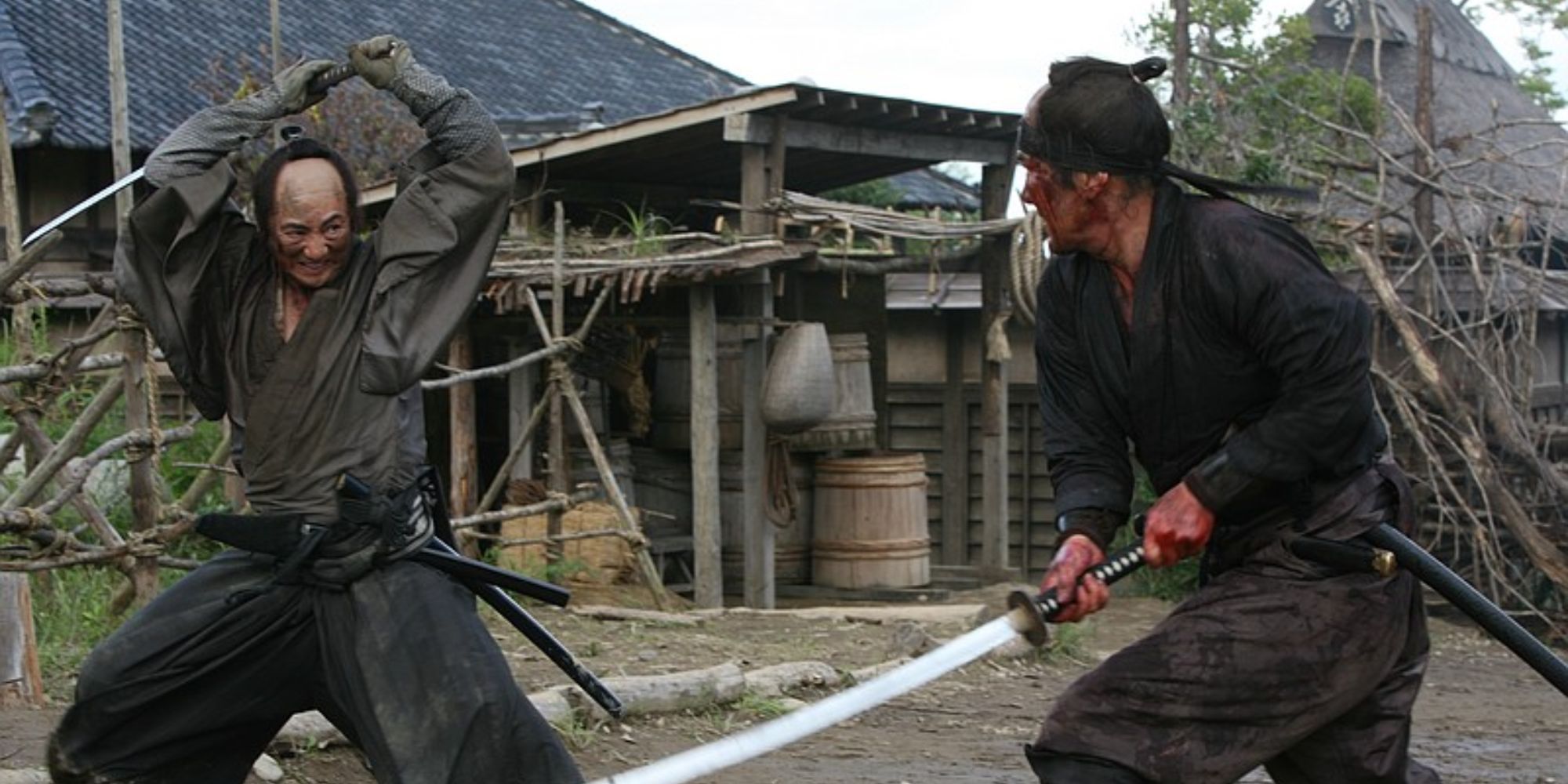 Two samurais are fighting against each other in a rural area of Japan